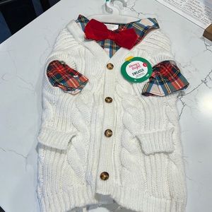 Sweater with plaid shirt and bow tie